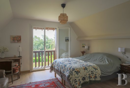 En Normandie, dans le parc régional des Boucles de la Seine, une villa de style anglo-normand - photo  n°30